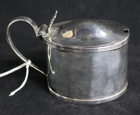 A George III Scottish silver oval mustard, I.p, Edinburgh, 1818, height 68mm.